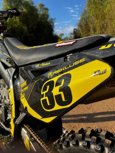 DeCal Works Custom Dirt Bike Decals Black with Yellow Officially Licensed ICW Radiator Logos