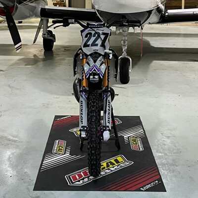 DeCal Works Custom Dirt Bike with white and black graphics, a purple accent and BoyesenLogos