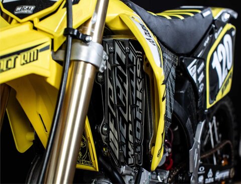 Suzuki RM250 Dirt Bike with Custom Made DeCal Works Graphics Designed by Nic Wright with Radiator Louver Decals